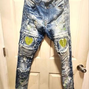 Distressed Blue Jeans with Green Accents